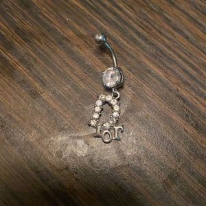 Beautiful silver Dior belly ring